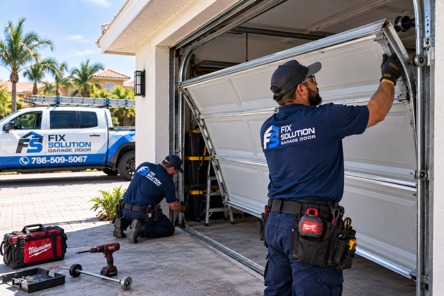 Off-track garage door hanging at an angle being inspected by a FIX SOLUTION GARAGE DOOR technician in Miami, Florida